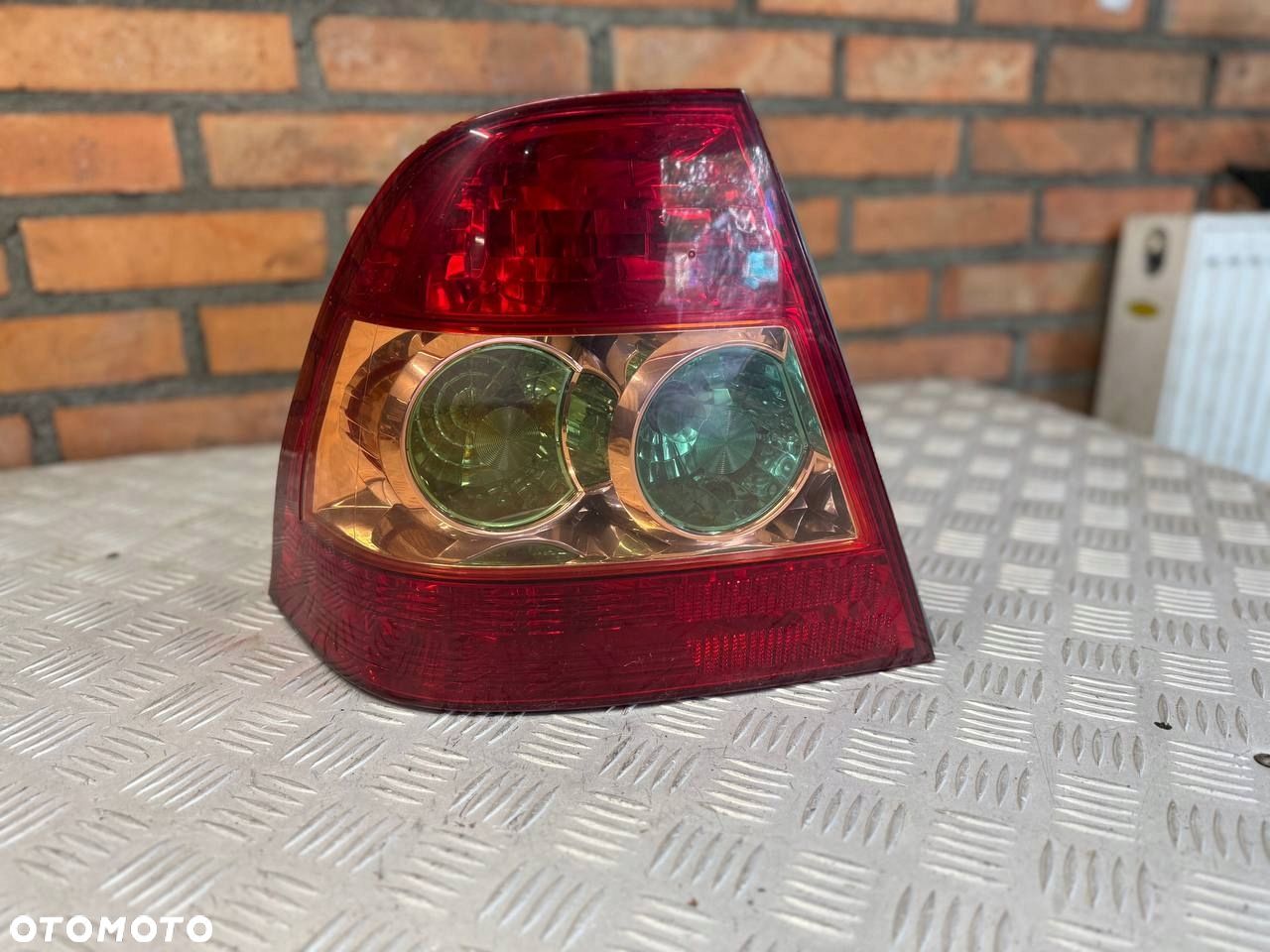 LAMPA LEWA TYLNA TOYOTA COROLLA E12 SEDAN - 1