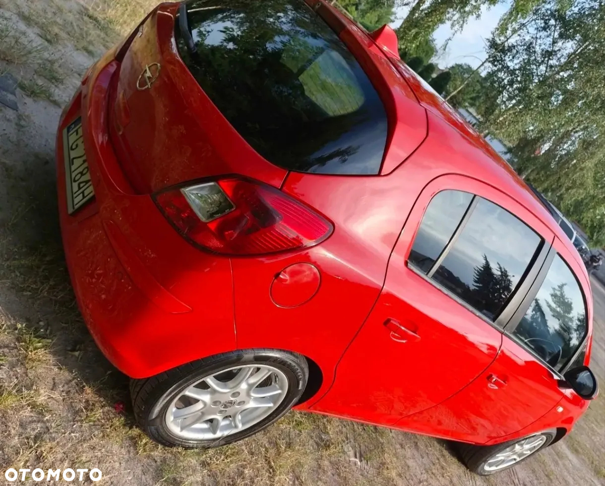 Opel Corsa 1.4 16V Cosmo - 12