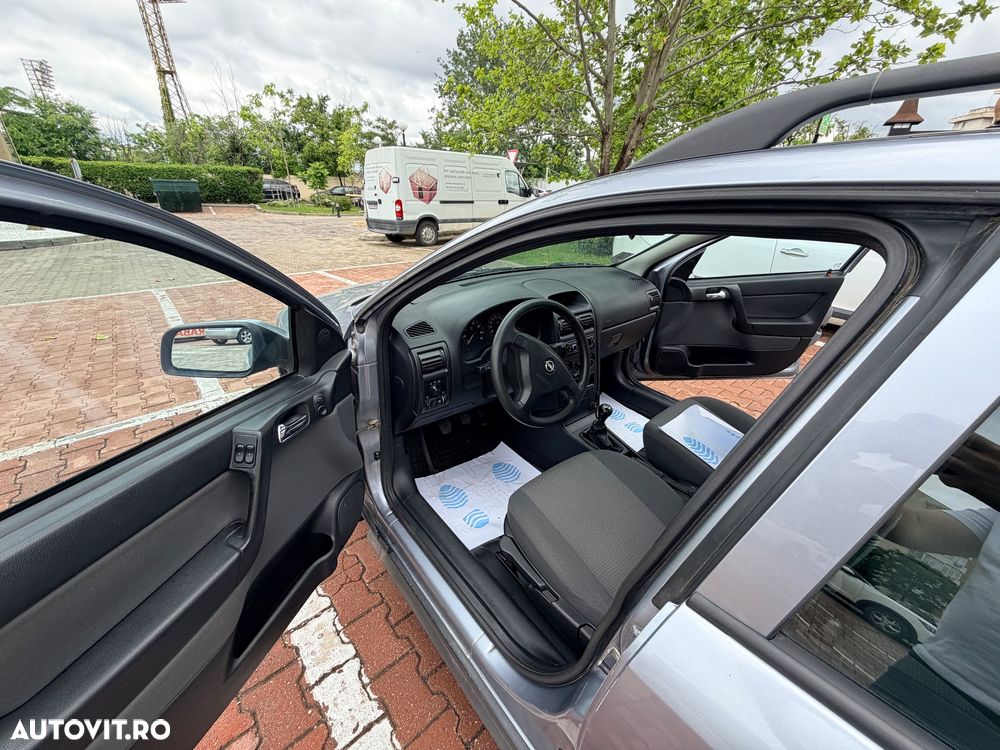 Opel Astra 1.6i Cosmo - 1