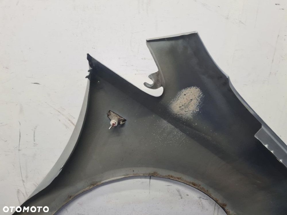 OPEL CORSA D BŁOTNIK PRZÓD LEWY - 8