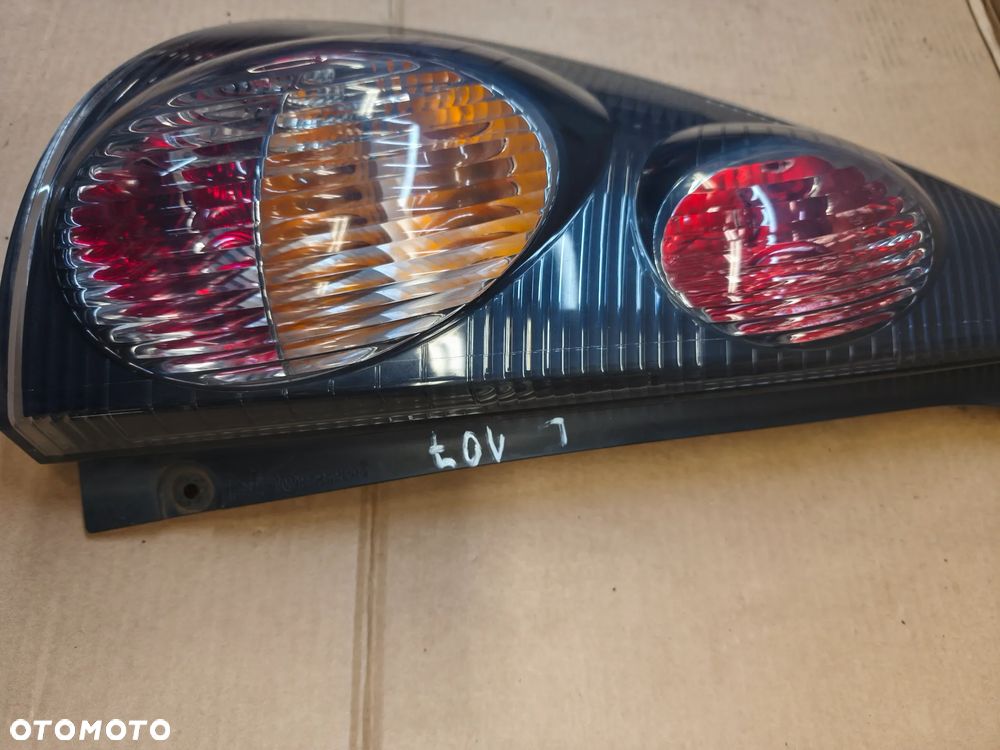 LAMPA TYŁ TYLNA LEWA PEUGEOT 107 - 1
