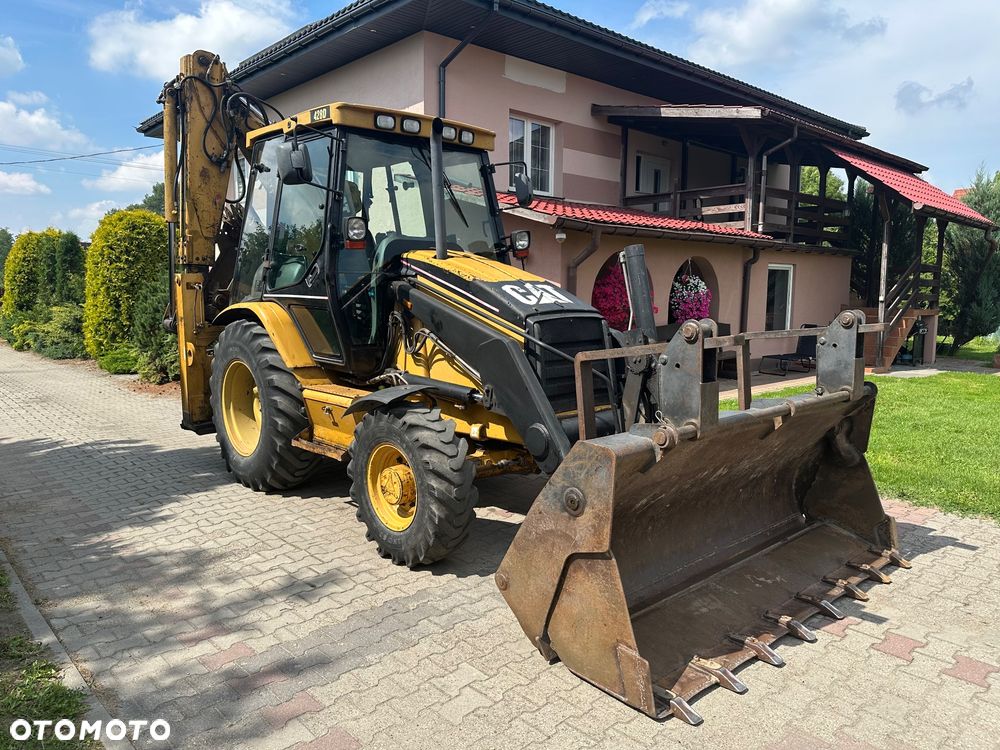 Caterpillar CAT 428D 2002 rok 4x4 moc 80KM - 1
