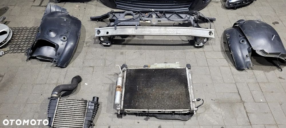 Renault Clio III lift 09-12 5d 1.2 TCE Maska zderzak blotniki lampy pas zestaw NV676 - 8