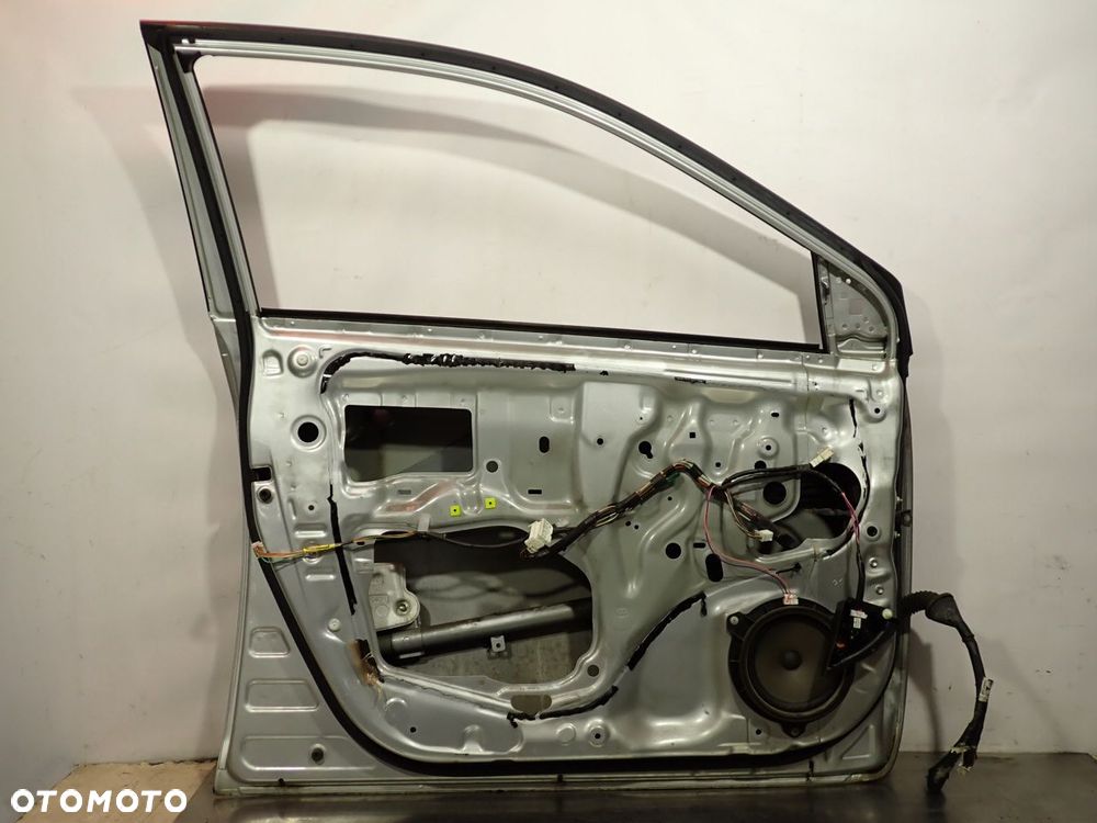DRZWI LEWY PRZÓD TOYOTA COROLLA E15 KOL: 1F7 - 16
