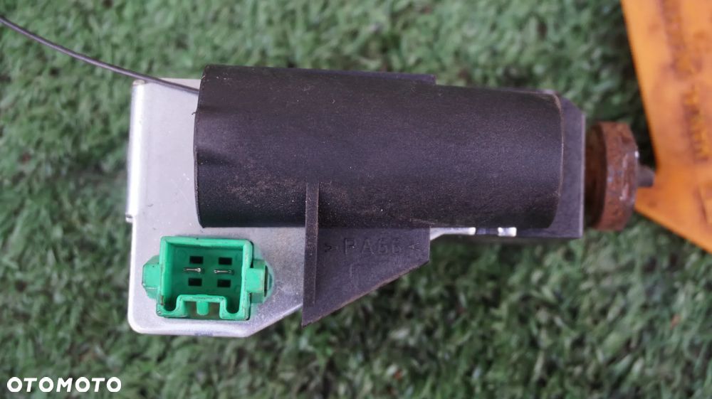 Saab 9-5 2.3 turbo 250 KM  AERO B235R silownik klapki wlewu paliwa 5117072 - 2