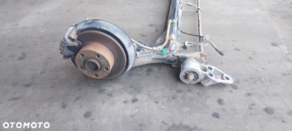 BELKA OŚ ZAWIESZENIA TYŁ TARCZE Z ABS HAMULCE ZACISKI SKODA SUPERB I - 4