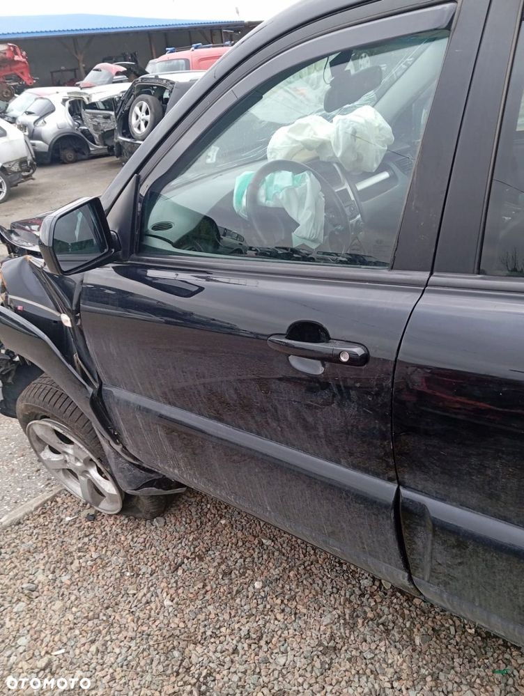 KIA SPORTAGE II LIFT DRZWI LEWE PRZÓD PRZEDNIE GOŁE 1K - 1
