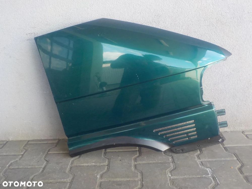 VW T4 CARAVELLE LIFT BŁOTNIK PRAWY ORYGINAŁ