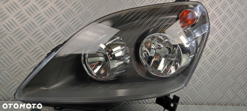 lampa reflektor lewy lewa przód przednia OPEL ZAFIRA B II 2 2005- EUROPA - 2