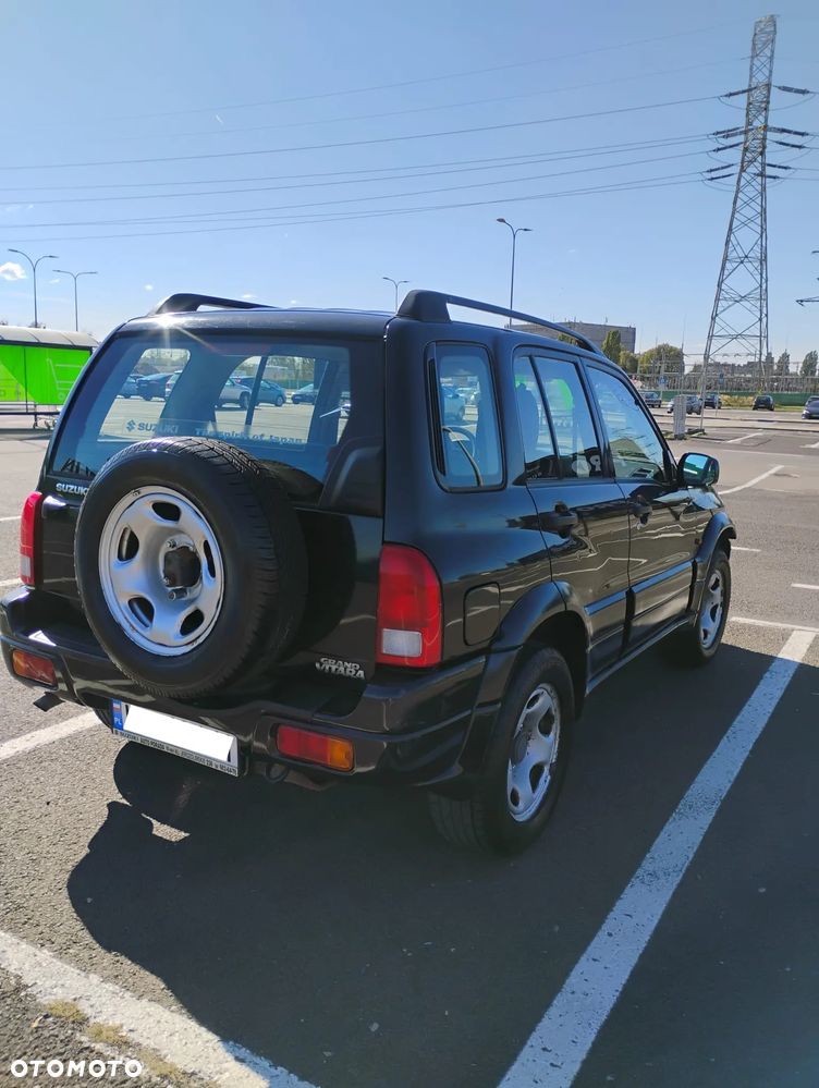 Suzuki Grand Vitara 2.0 - 7
