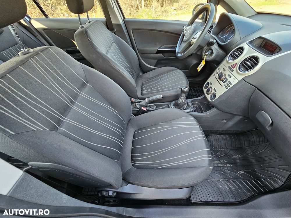 Opel Corsa 1.2i Cosmo - 11