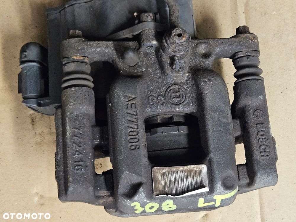 Peugeot 308 T9 zacisk hamulcowy tyl prawy lewy - 9