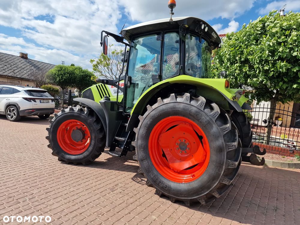 Claas Arion 520, 2014r,120KM - 8