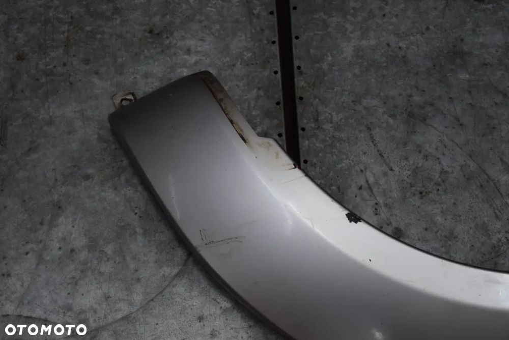 NISSAN NAVARA D22 LISTWA BŁOTNIKA LEWA  TYŁ 4D - 2