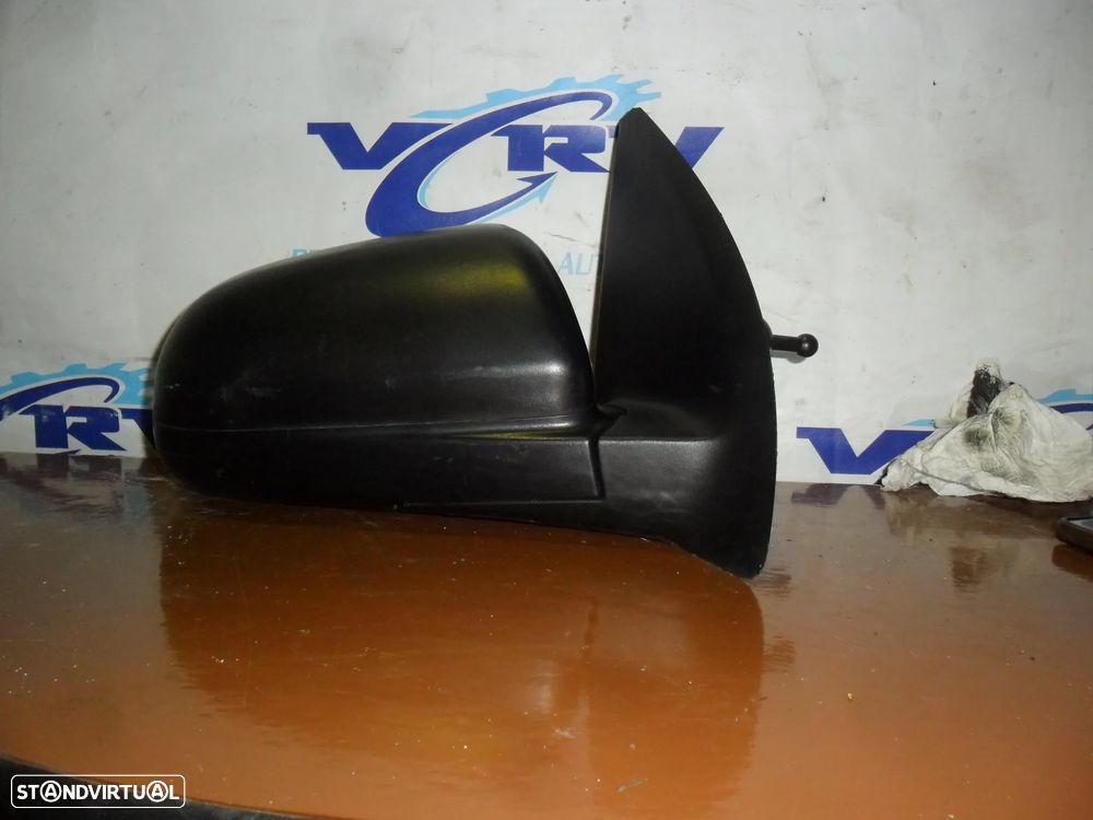 Espelho retrovisor direito manual Chevrolet Aveo 2010 - 2