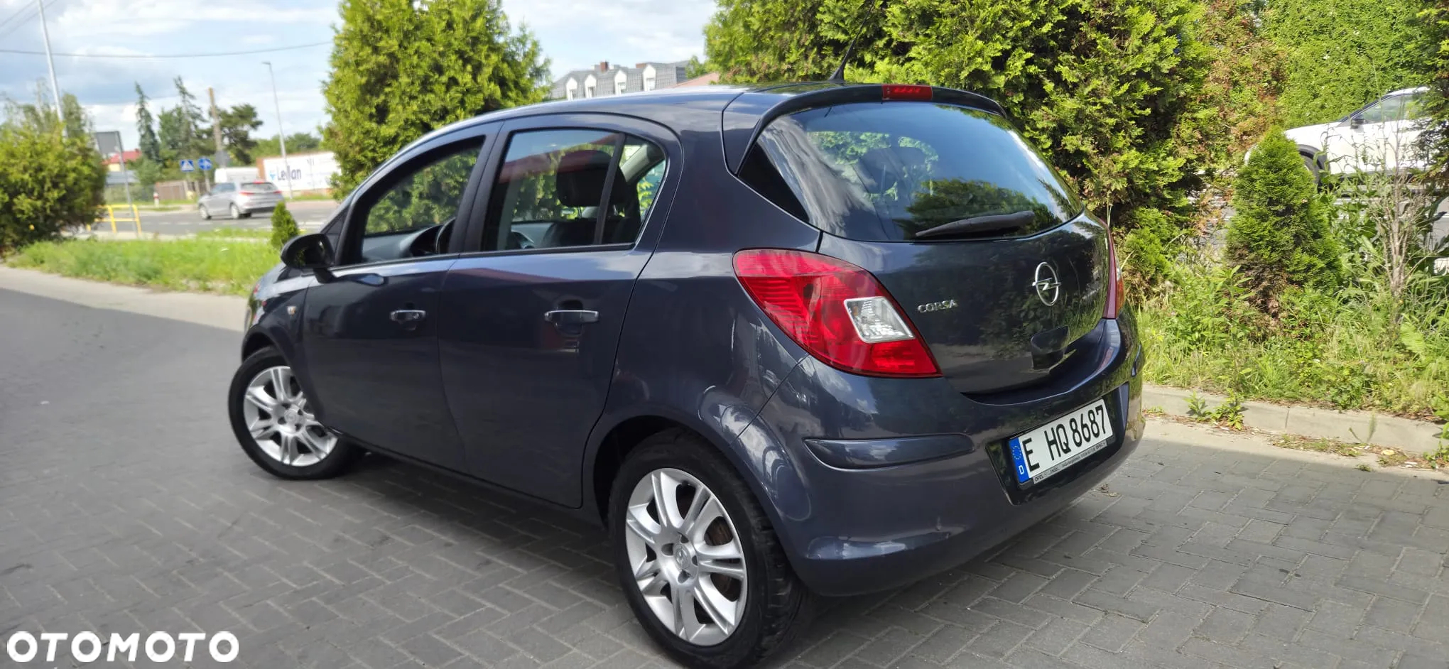 Opel Corsa 1.4 16V Cosmo - 11