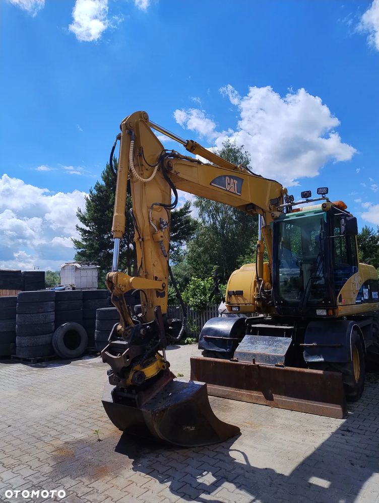 Caterpillar M313C - 4