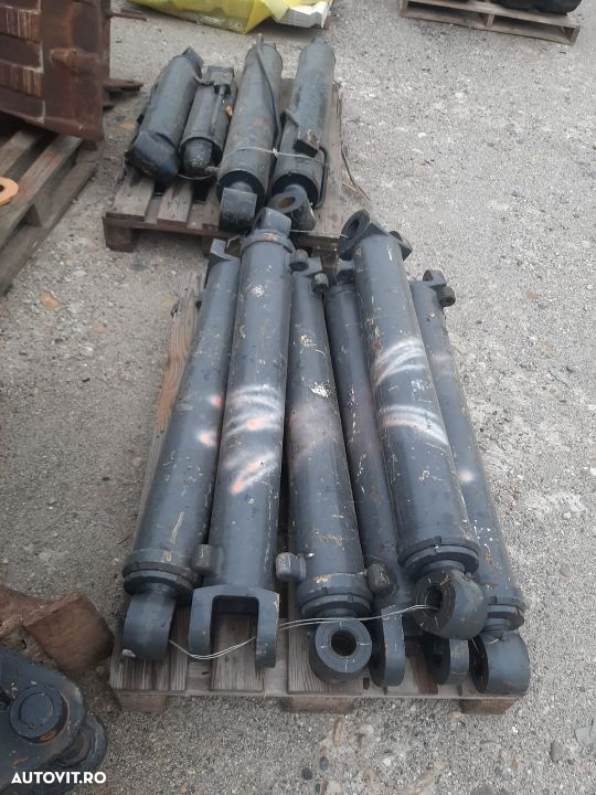 Cilindri brat spate buldoexcavator  New holland B 110,noi - 2