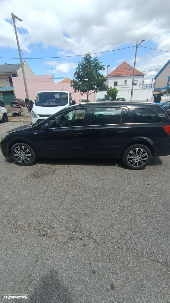 Opel Astra Caravan ver-1-7-cdti-cosmo - 4