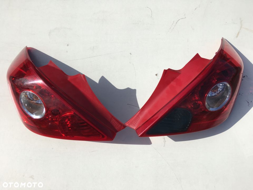 OPEL CORSA D 06- LAMPA PRAWA LEWA EUROPA 3D ORYG. - 1