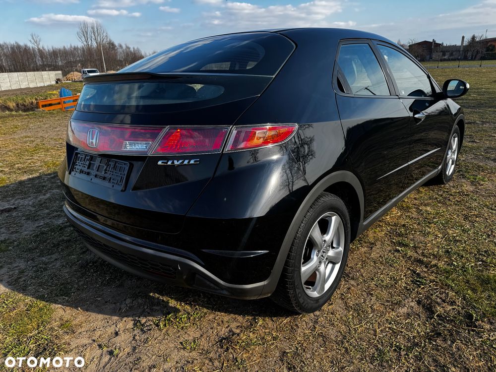 Honda Civic 1.4i-DSi - 11