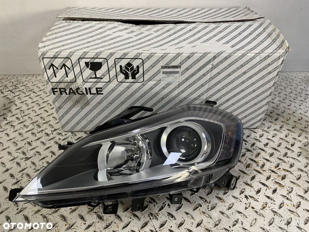 NOWA ORYGINALNA LAMPA LAMPA LEWA PRZEDNIA LEWY PRZÓD LANCIA DELTA 08-14 51876348 - 2