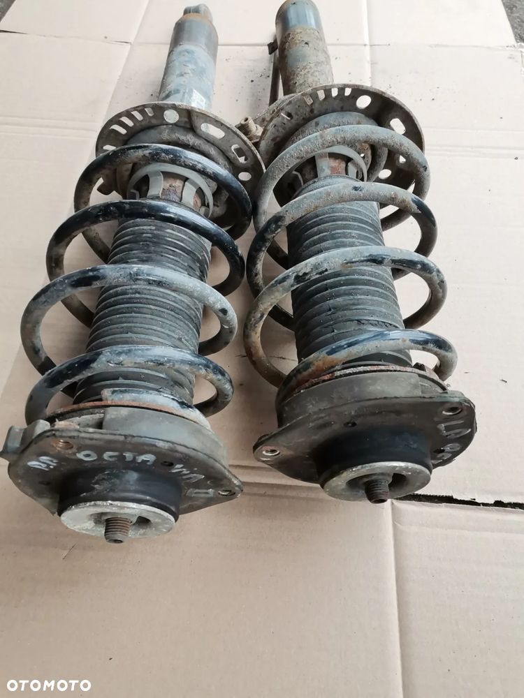 Mcperson amoryzator  prawy lewy przod Skoda Octavia II - 1