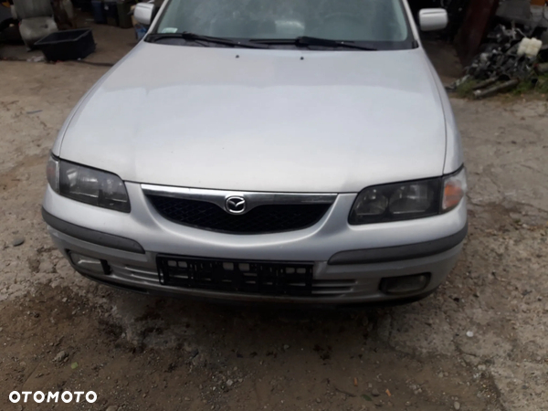 Mazda 626 GF GW 97-02   Maska lampa zderzak pas atrapa 18G 22V
