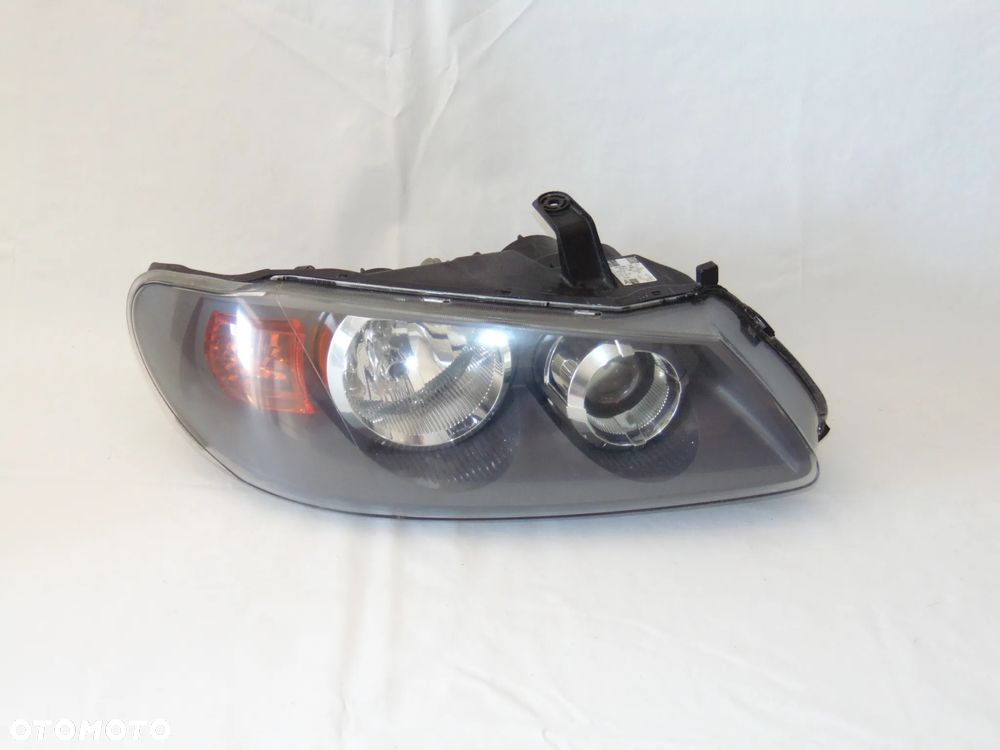 ORYGINAŁ lampa przednia przód lewa prawa Nissan Almera N16 lift FL 02-06r - 2