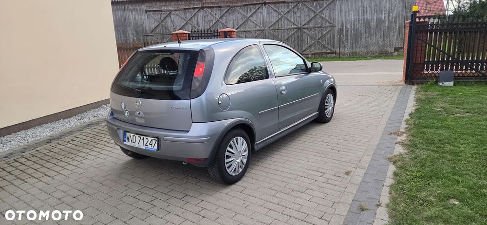 Opel Corsa 1.2 16V Cosmo - 8