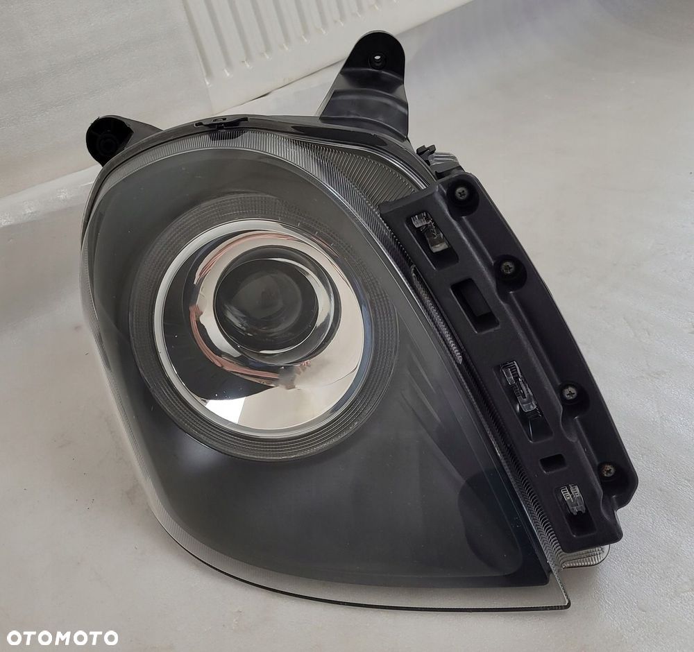 LAMPA PRAWA PRZÓD PRZEDNIA LEVC TX VN5 - 1