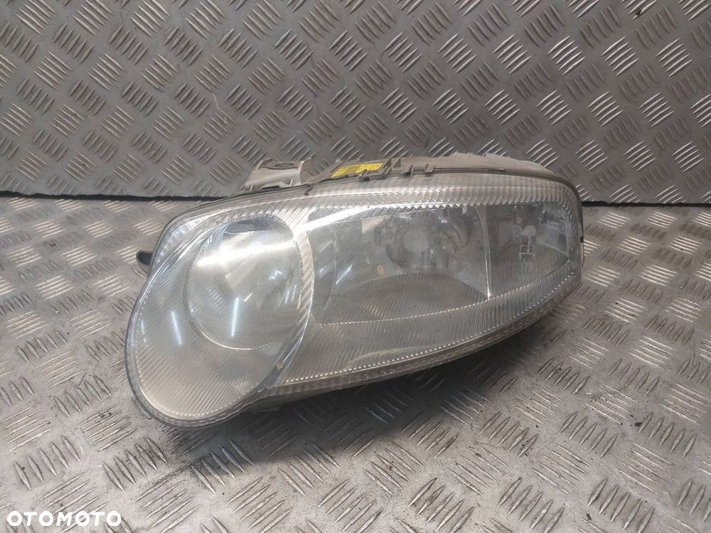 LAMPA LEWY PRZÓD ALFA ROMEO 147 I 0301186201 - 1