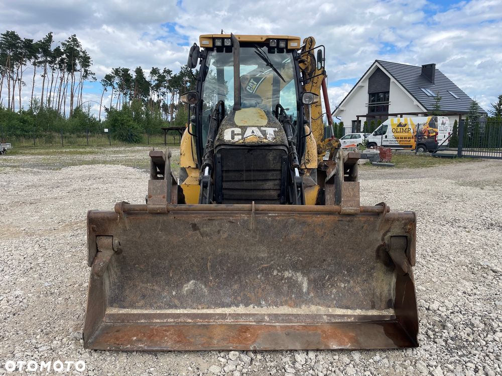 Caterpillar 428E - 7