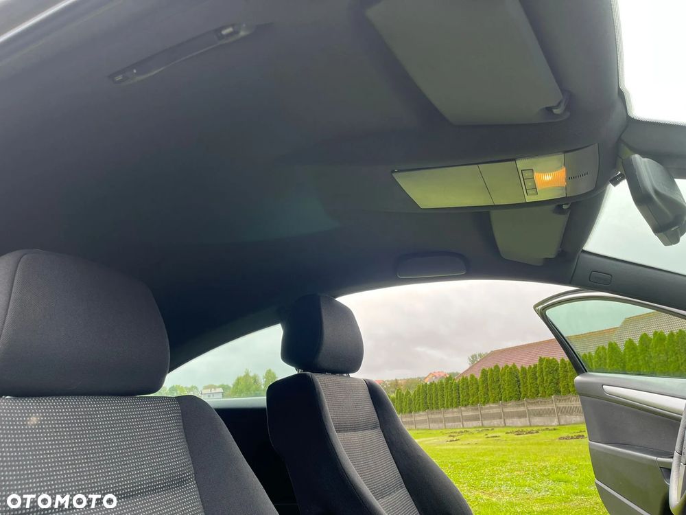 Opel Astra GTC 1.6 Sport - 12
