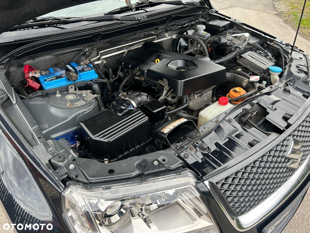 Suzuki Grand Vitara 2.0 - 13
