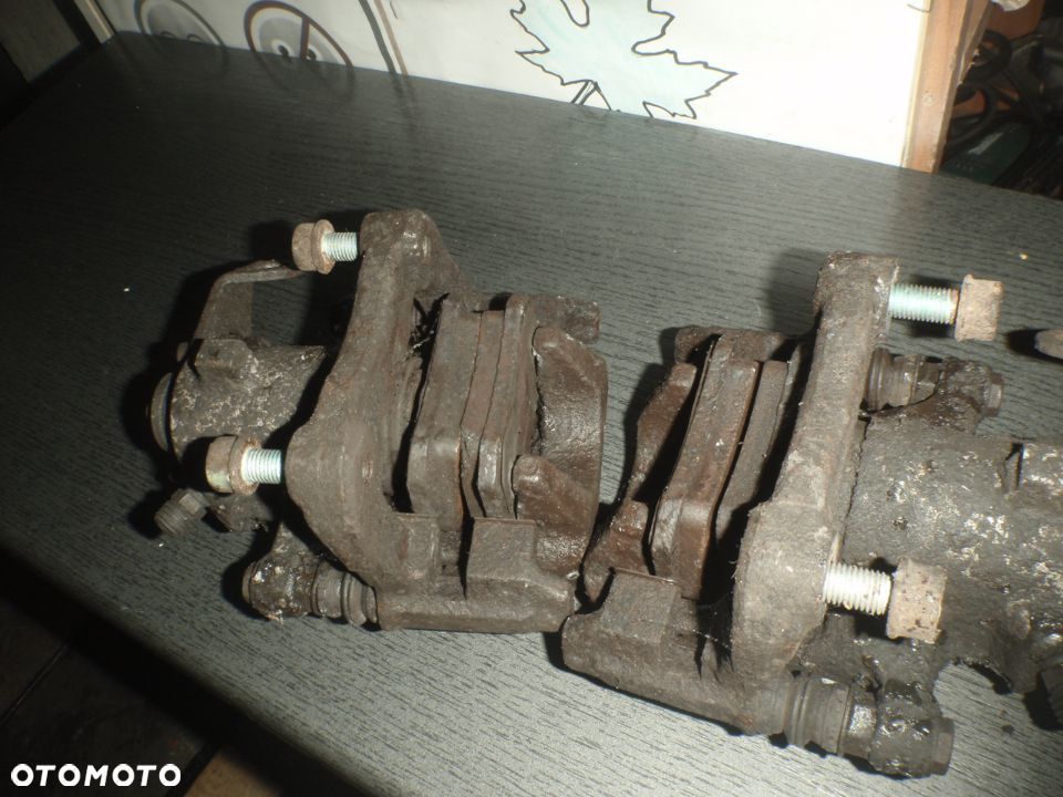zacisk jarzmo prowadnica hamulcowe tył tylne passat b5 fabia polo golf IV audi a3 a2 ibiza - 9