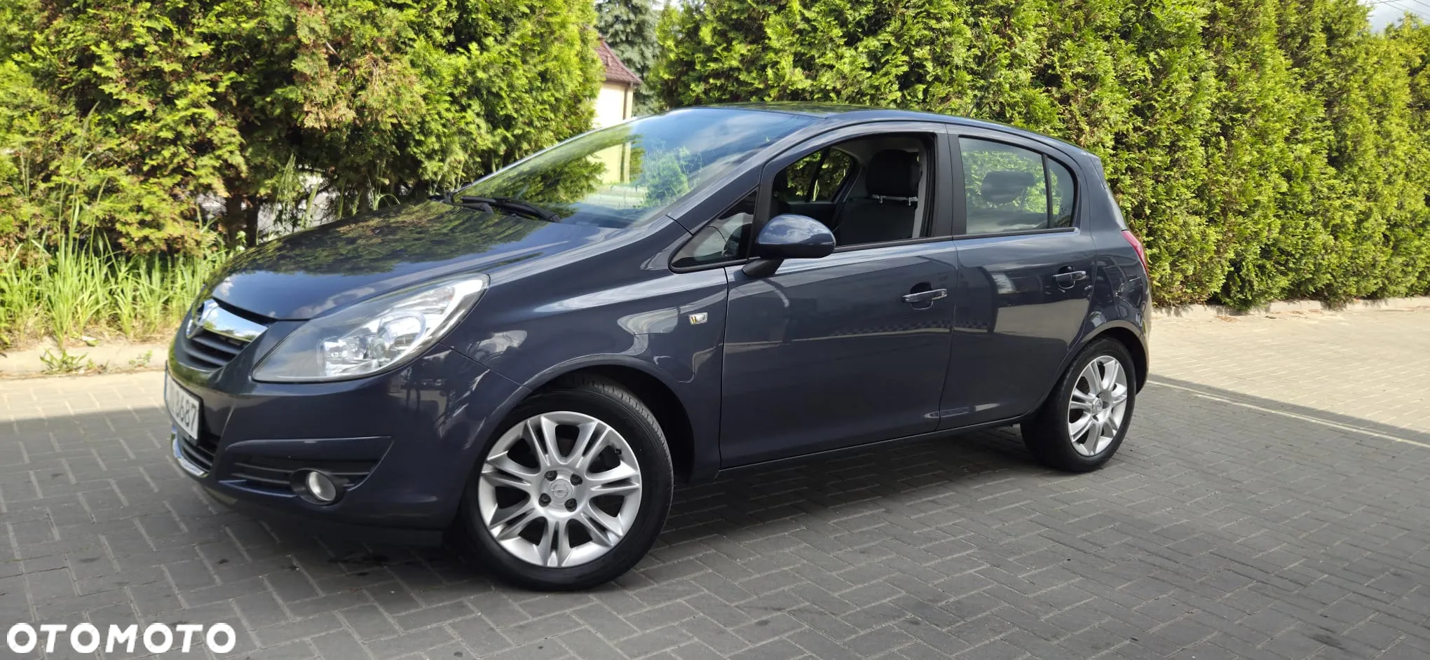Opel Corsa 1.4 16V Cosmo - 5