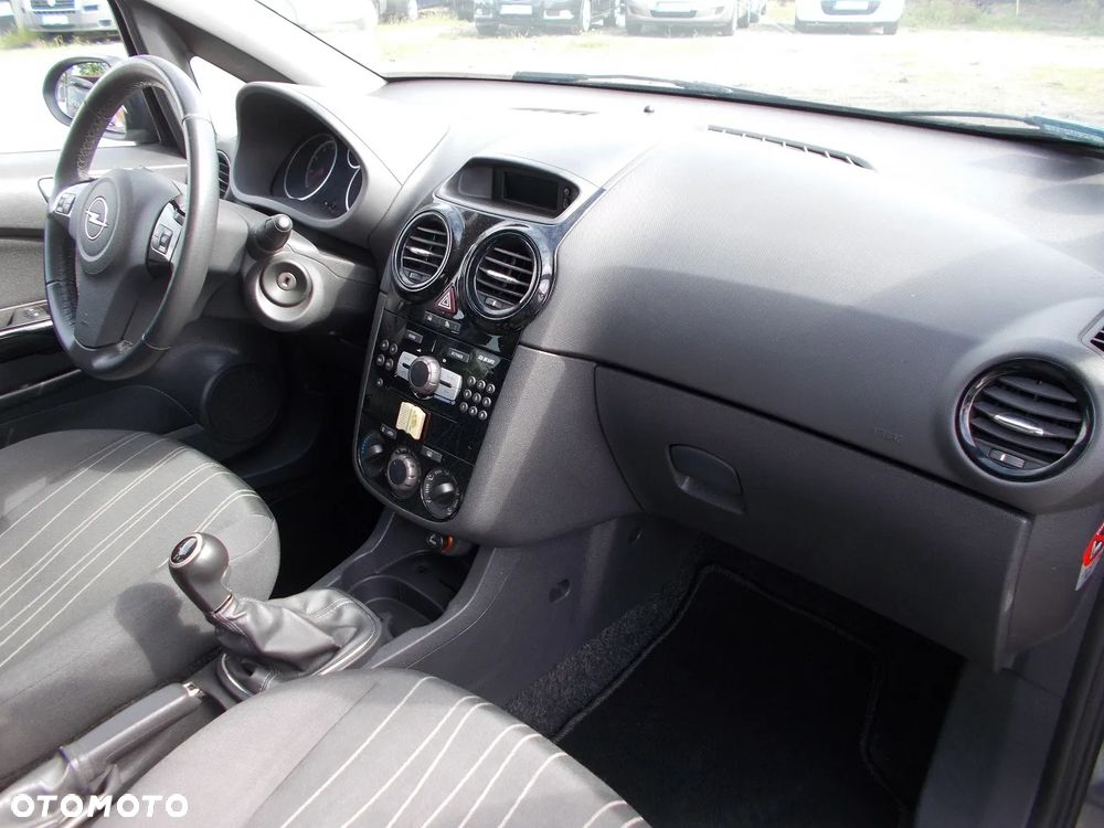 Opel Corsa 1.2 16V Enjoy - 11