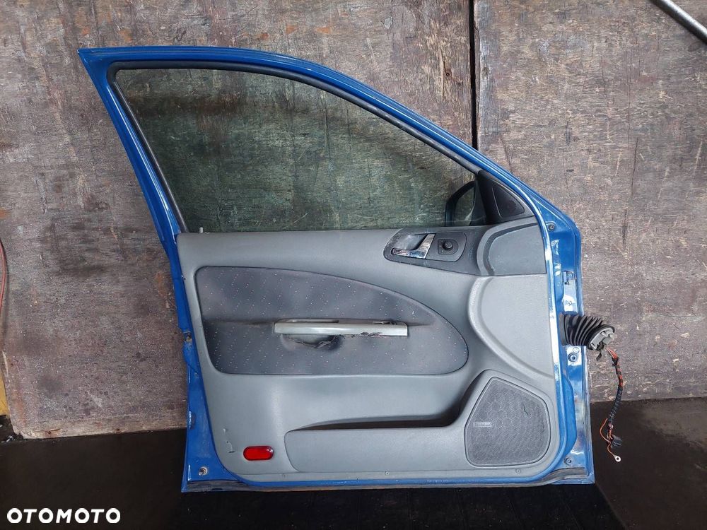 DRZWI KOMPLETNE LEWY PRZÓD SKODA OCTAVIA I FL 4590 - 5
