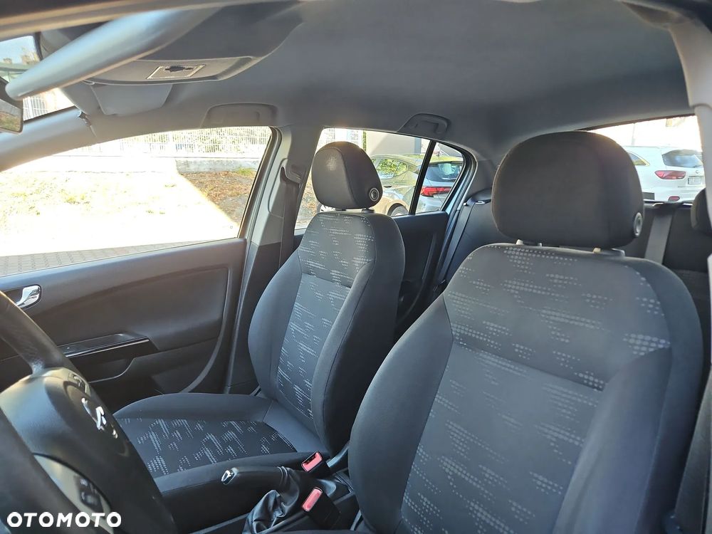 Opel Corsa 1.2 16V Enjoy - 11