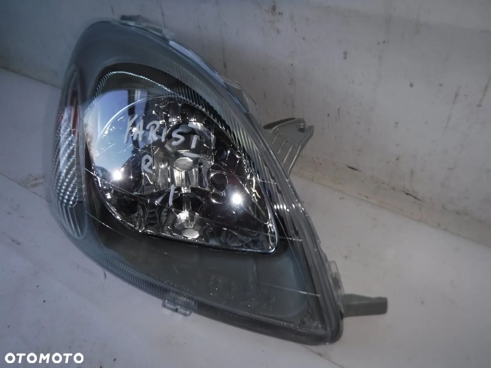 toyota yaris 1 i lampa przód prawa przednia nowa - 7