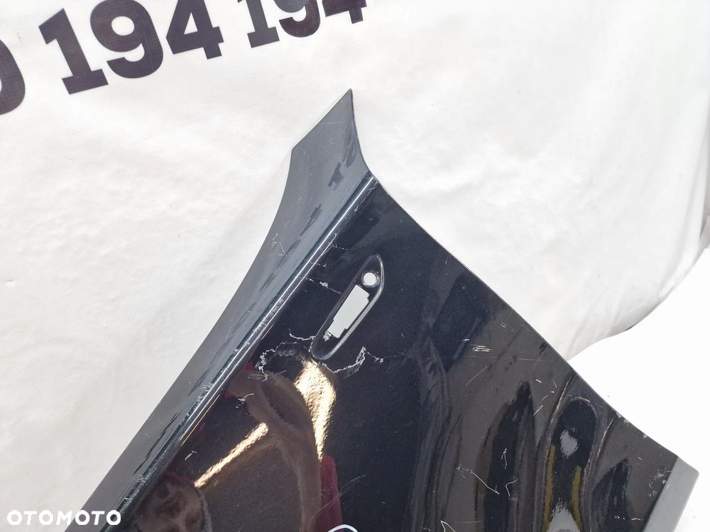 BMW E87 / E88 / E81 04- LEWY BŁOTNIK PRZEDNI PRZÓD , NR AUKCJI BŁ35 - 10