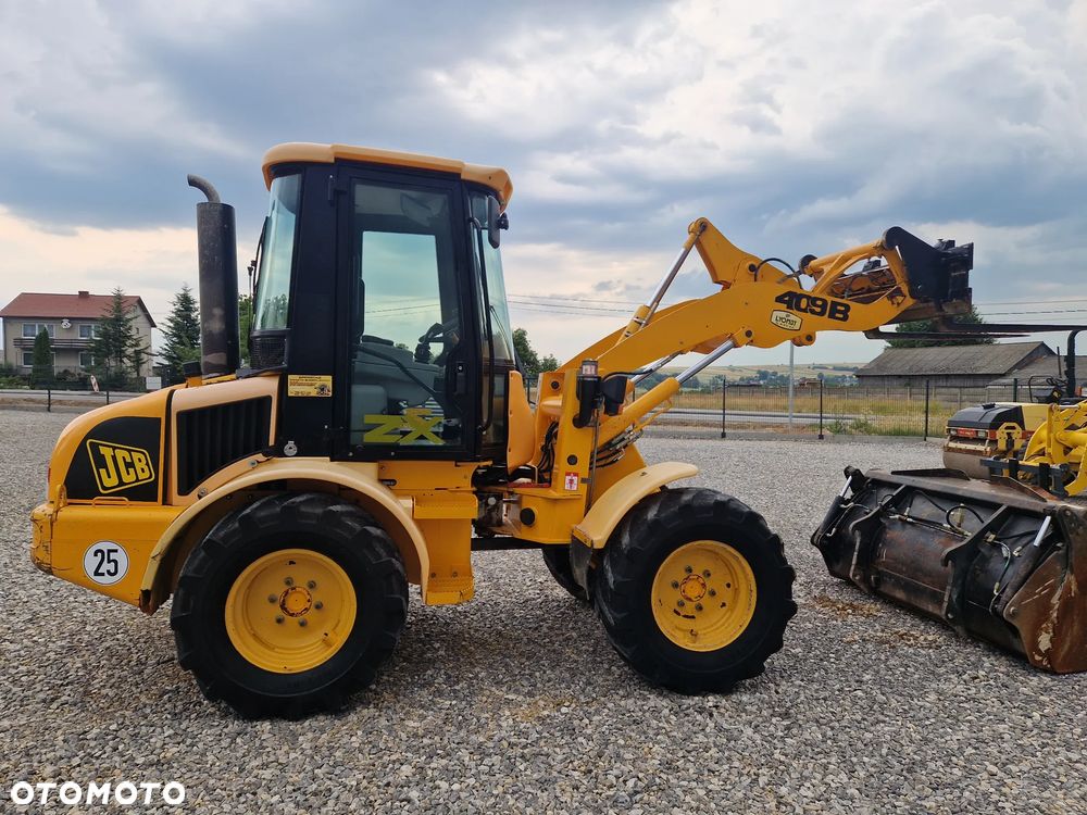 JCB 409 - 3
