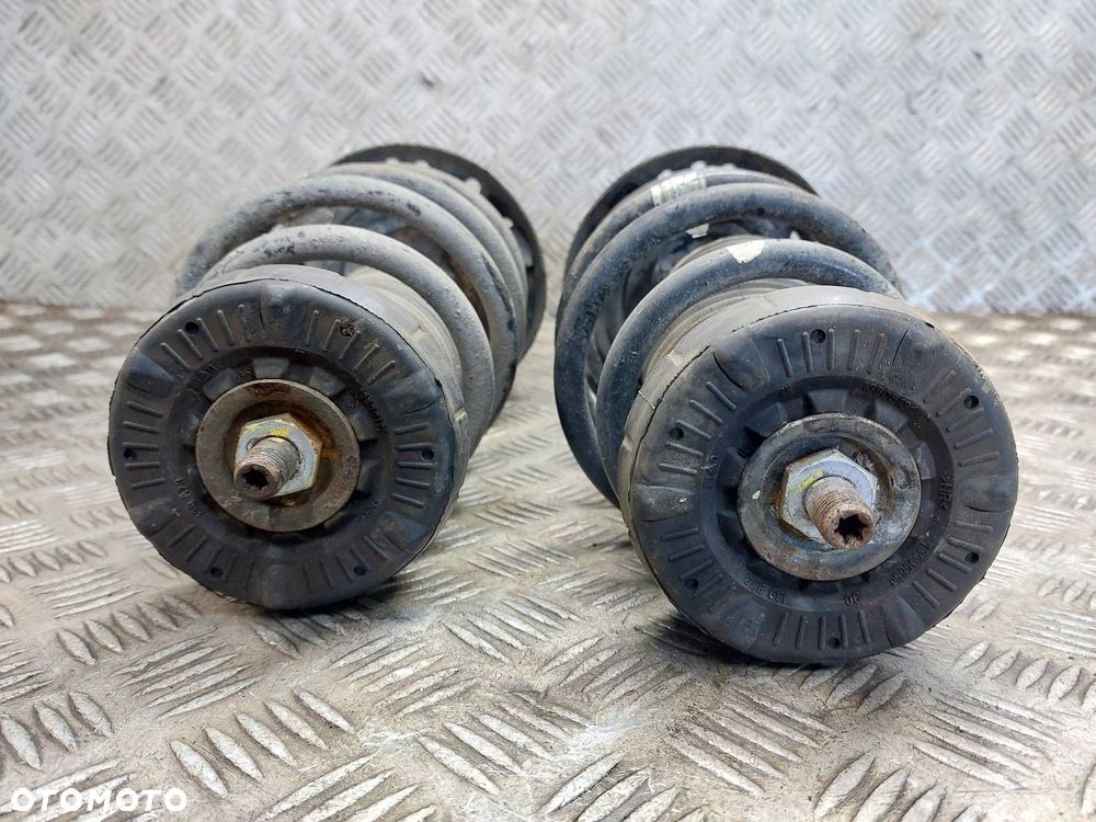AMORTYZATOR + SPRĘŻYNA LEWY PRZÓD + PRAWY PRZÓD ASTRA J 1.4 T 13412609 - 2
