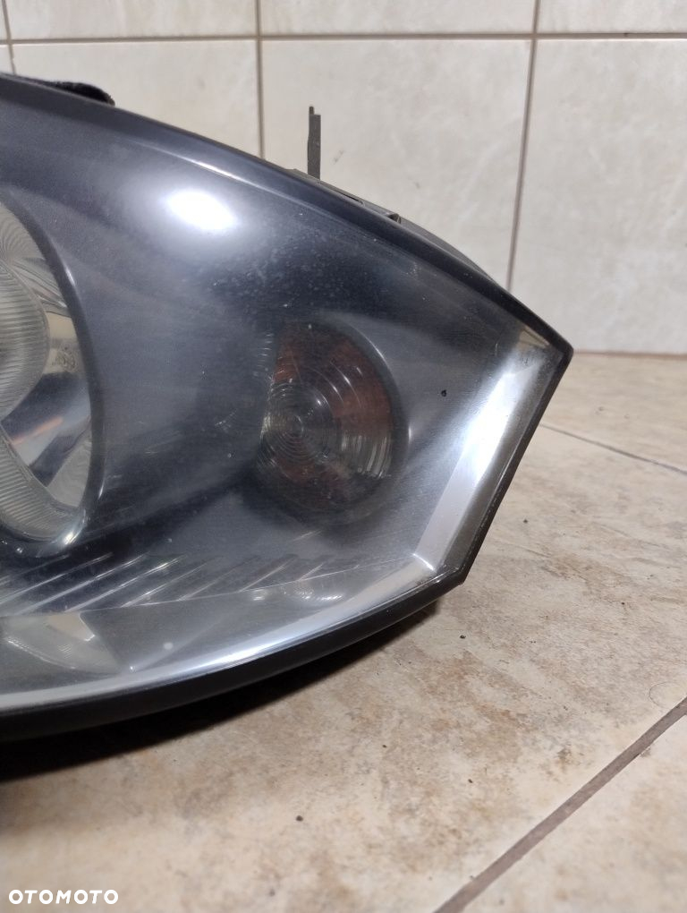Audi a2 reflektor lampa lewa przód Europa oryginał wysyłka OLX - 4