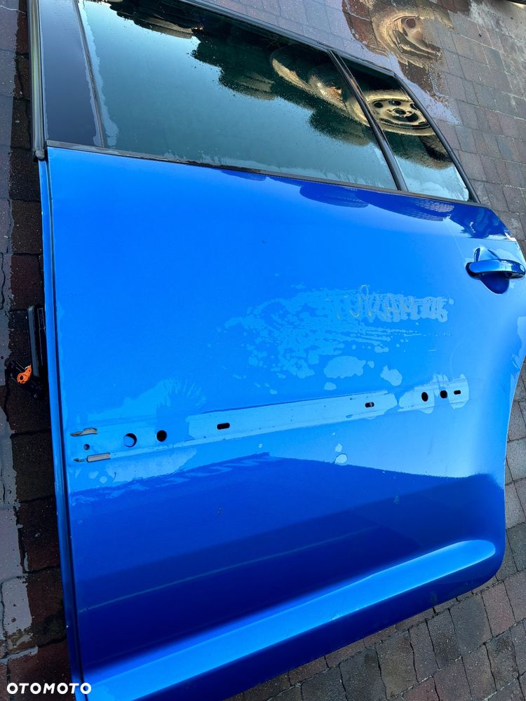 VW TOURAN DRZWI LEWY TYL TYLNE 06’ - 2