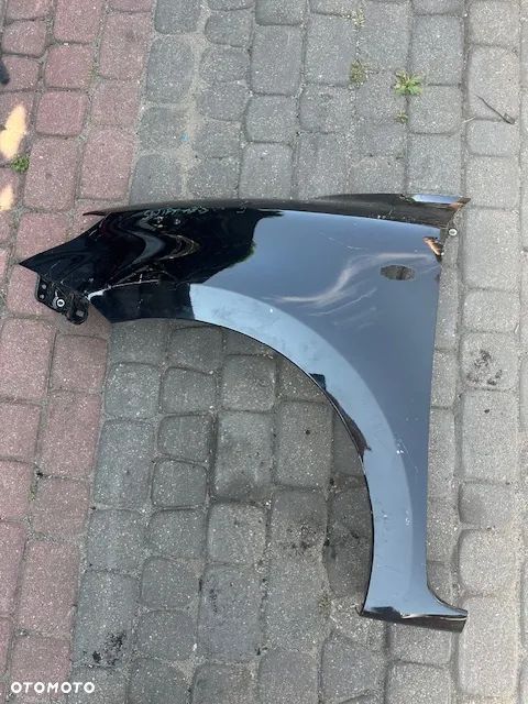 BŁOTNIK LEWY SUZUKI SWIFT 17- PRZEDNI