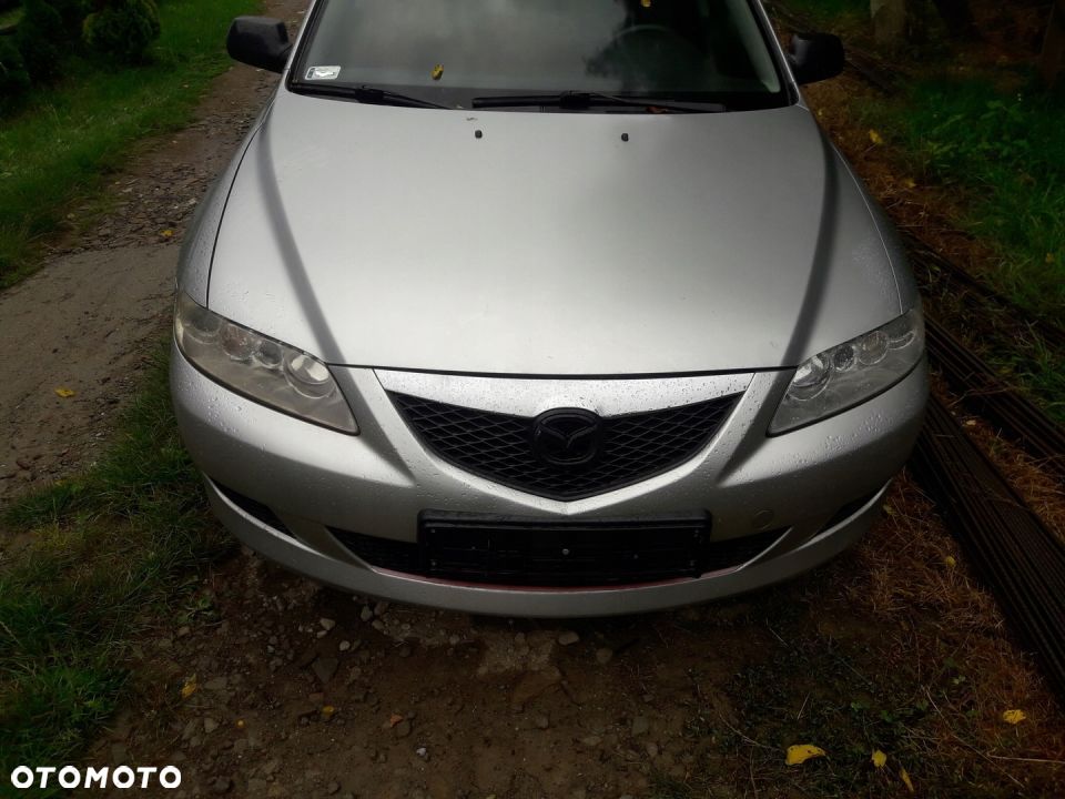 Mazda 6 02-07 Maska lampa zderzak pas atrapa 25H - 1