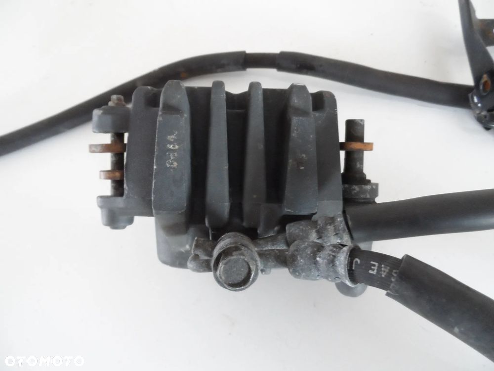 KAWASAKI ER6N zacisk hamulcowy przód P,L - 6