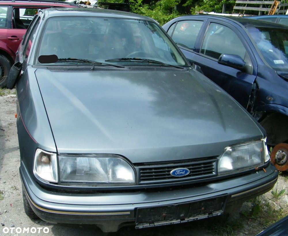 Ford Sierra (91-93r.) 2.0B 115KM. Silnik N9E Skrzynia A4LD lakier Polaris Grey. Cały na części GWARANCJA !!!  Przód Tył Zestaw Komplet Drzwi Klapa Zderzak Błotnik Maska Grill Atrapa Szyba Pas Lampa Lusterko Boczki Fotel Kanapa Kokpit Deska Rozdzielcza Przełącznik Włącznik Sterownik Przewody Wiązka Instalacja Moduł Komputer Czujnik Listwa Pompa Alternator Wtryski Głowica Rozrusznik Kompresor Sprzęgło Dwumas Silnik Skrzynia ABS Klimatyzacji Paliwa Wspomagania Kolektor Turbina Przepustnica Zawór Chłodnica Koło Hak Belka Sanki Zawieszenie Mcpherson Półoś Amortyzator Wydech Tłumik Zacisk Most - 2